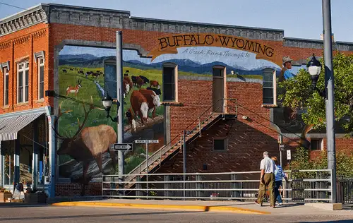 A mural on a brick wall in Buffalo, Wyoming